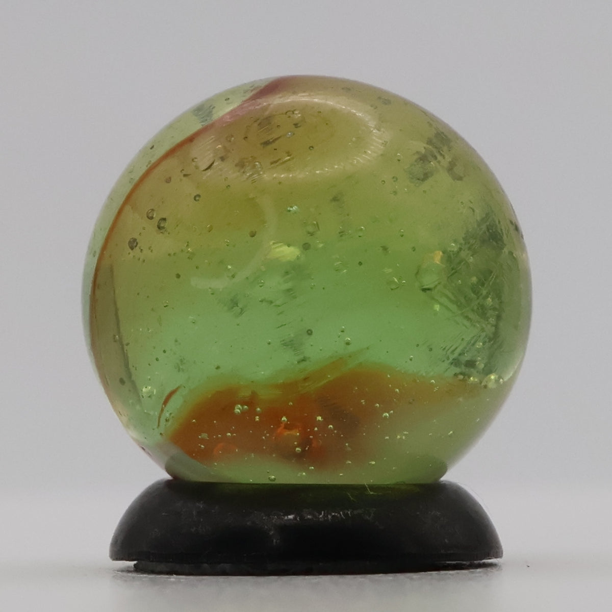 ~9/16" Peltier Rainbo Clear Based Marble - Translucent Green Base NM+