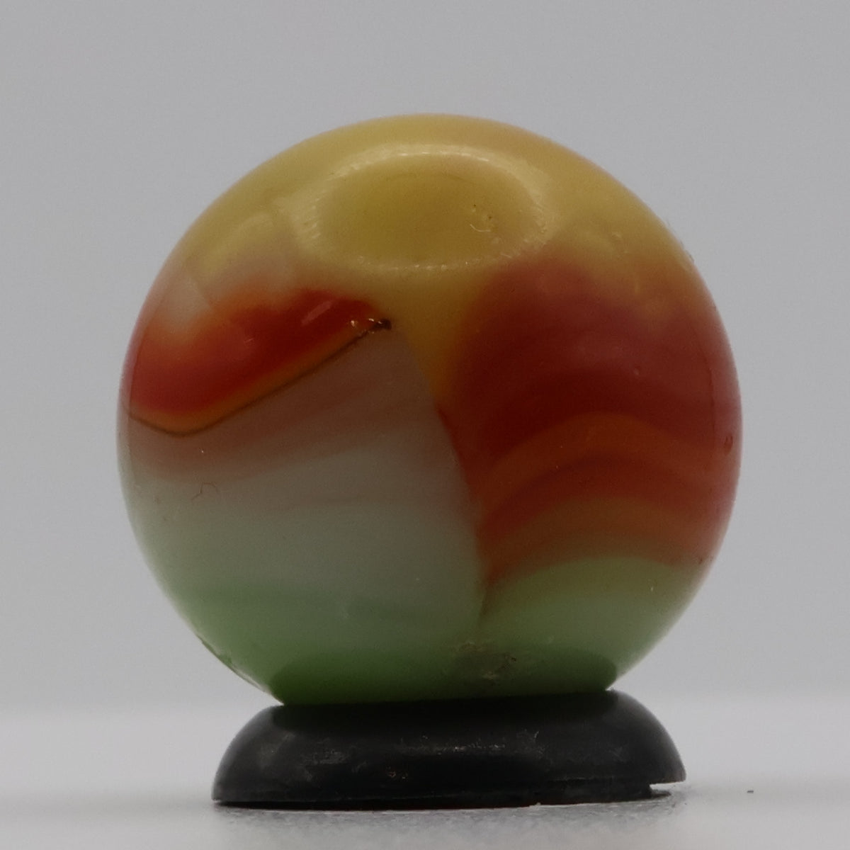 11/16" Vitro Agate Marble Parrot/Parakeet strip of oxblood NM-