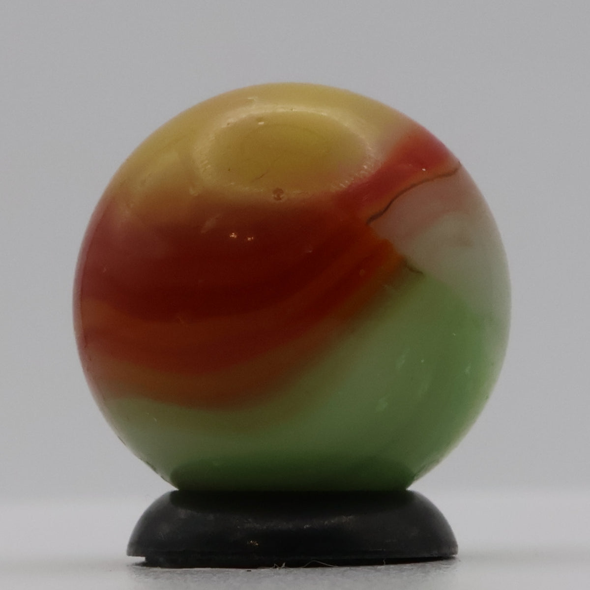 11/16" Vitro Agate Marble Parrot/Parakeet strip of oxblood NM-