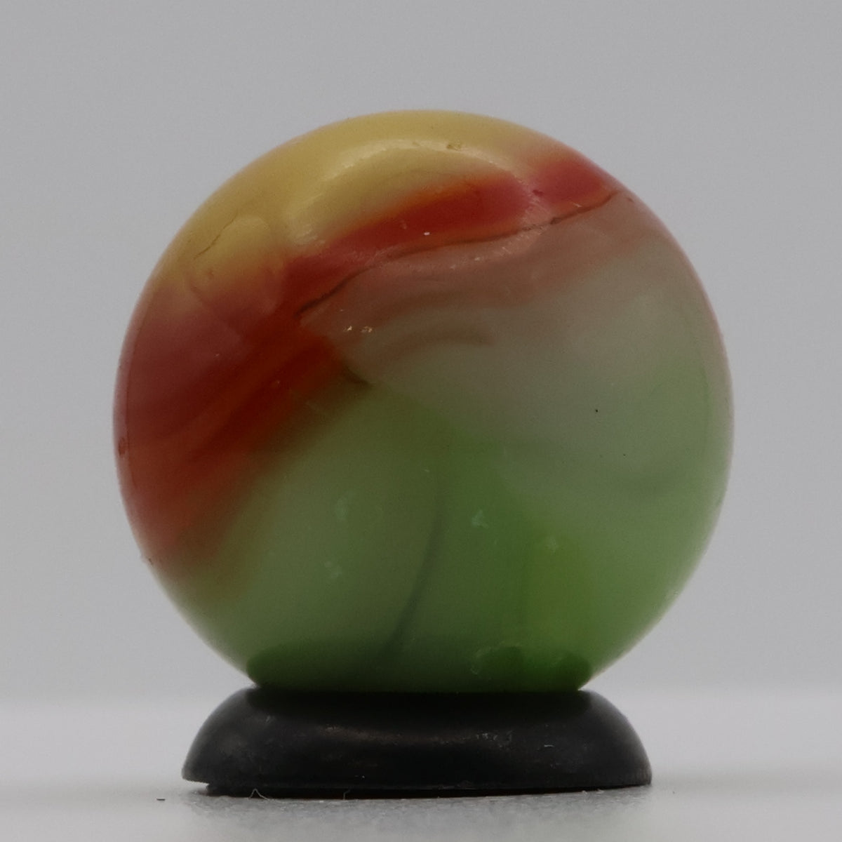 11/16" Vitro Agate Marble Parrot/Parakeet strip of oxblood NM-