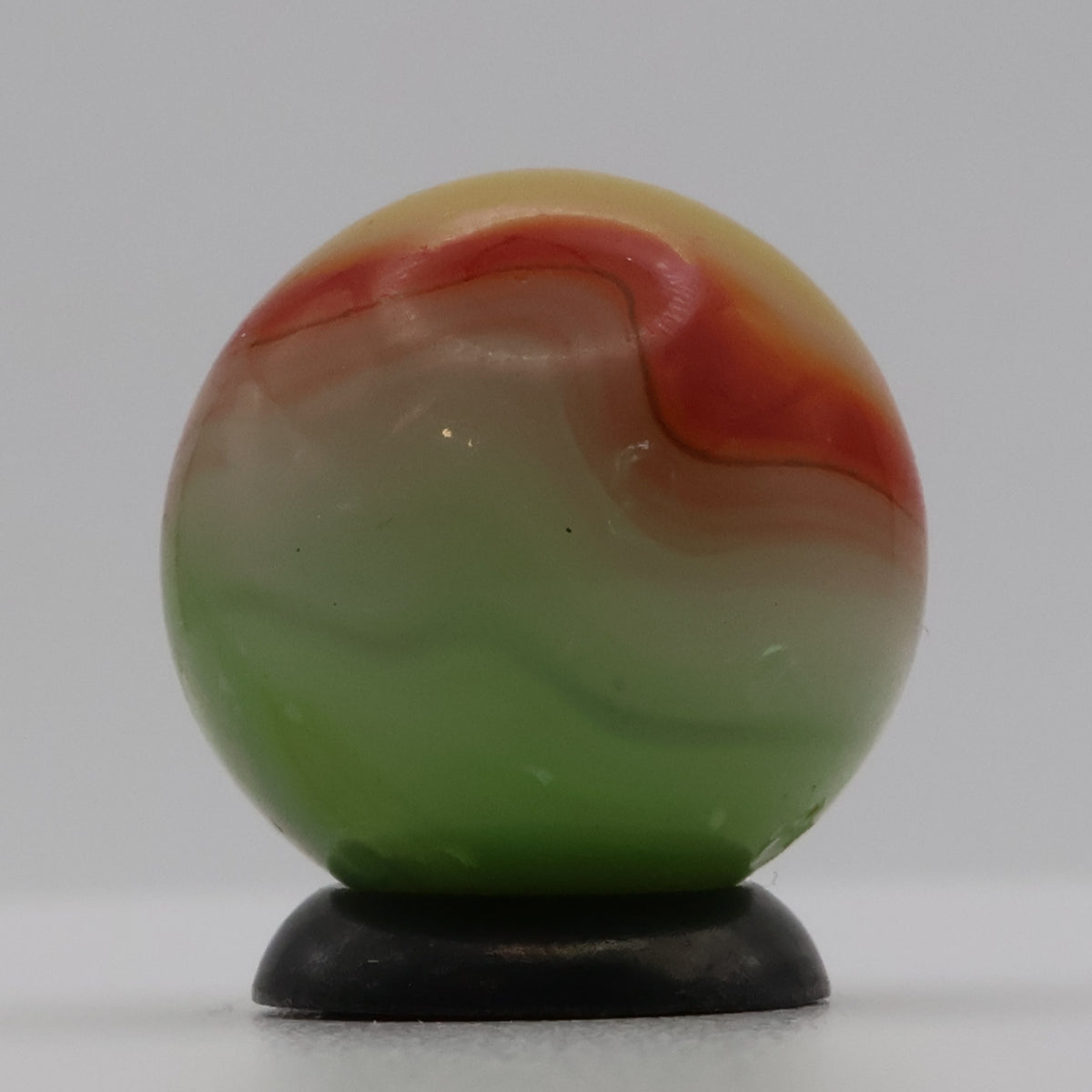 11/16" Vitro Agate Marble Parrot/Parakeet strip of oxblood NM-