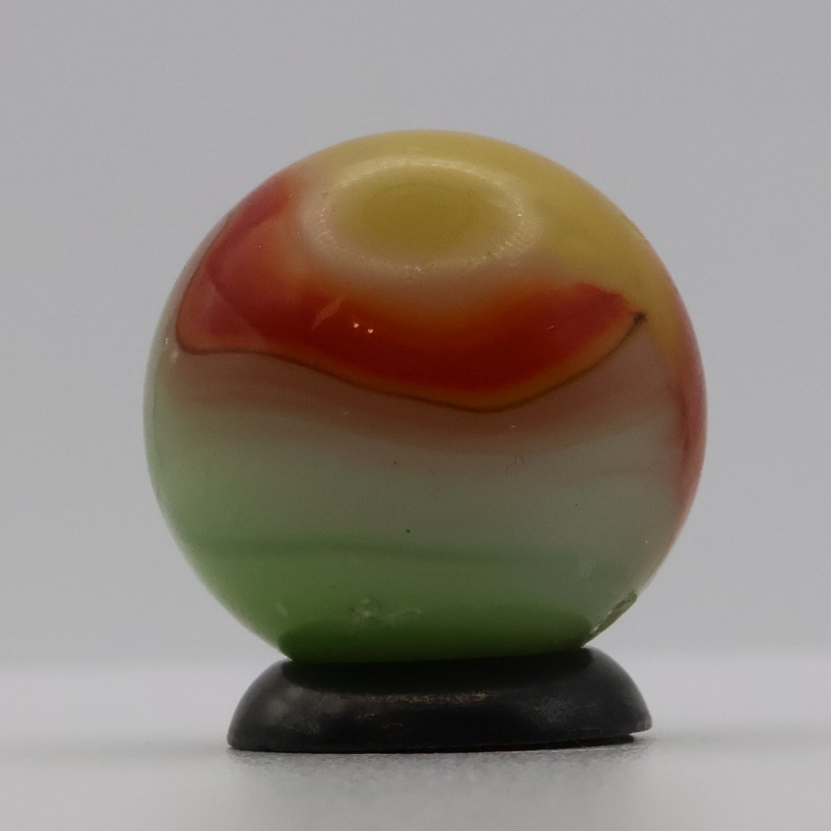 11/16" Vitro Agate Marble Parrot/Parakeet strip of oxblood NM-