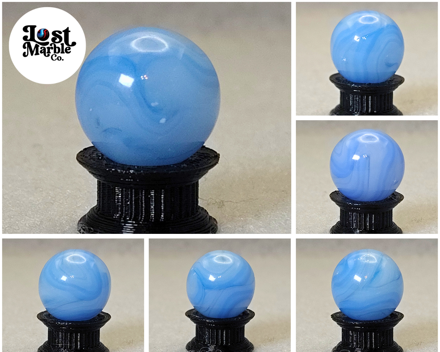 16mm Transparent Swirl Marble w/Blue stripes - Champion?  NM