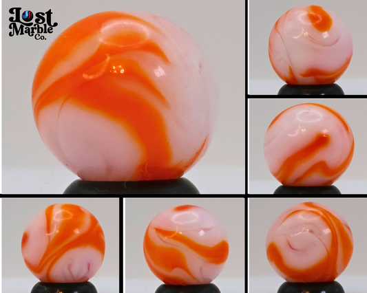 5/8" Swirl Marble orange & white, translucent base NM+