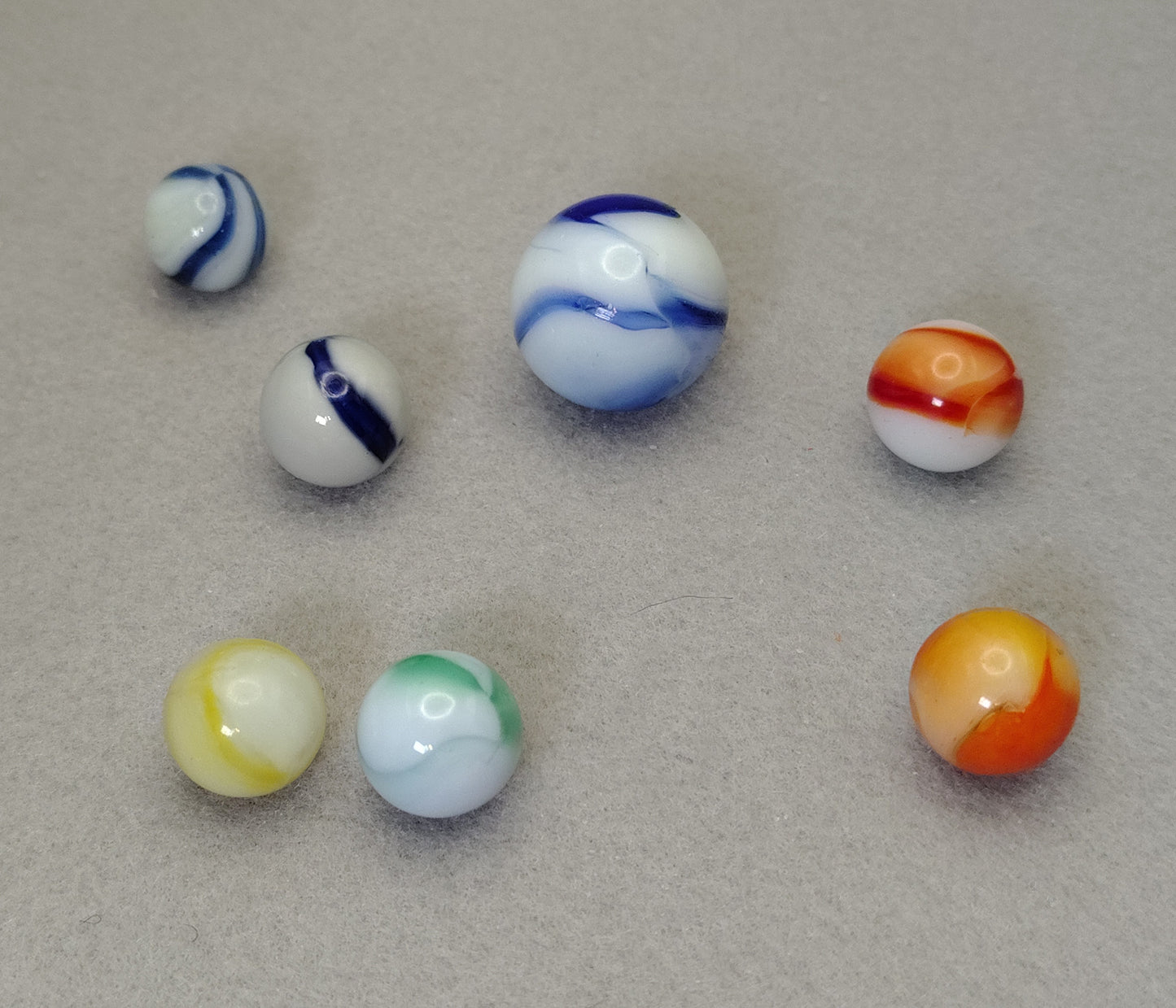 7 pack 9/16-7/8" glowing Peltier Rainbos, Shooter has orange peel feel NM to M