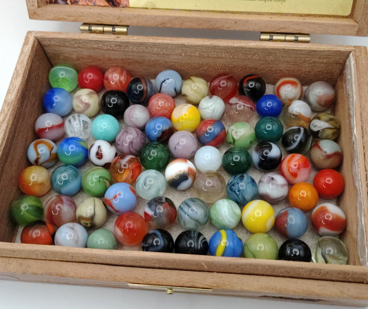 Variety of Marbles in cigar box- Smaller Marbles 14.0-15.5mm NM+ to M