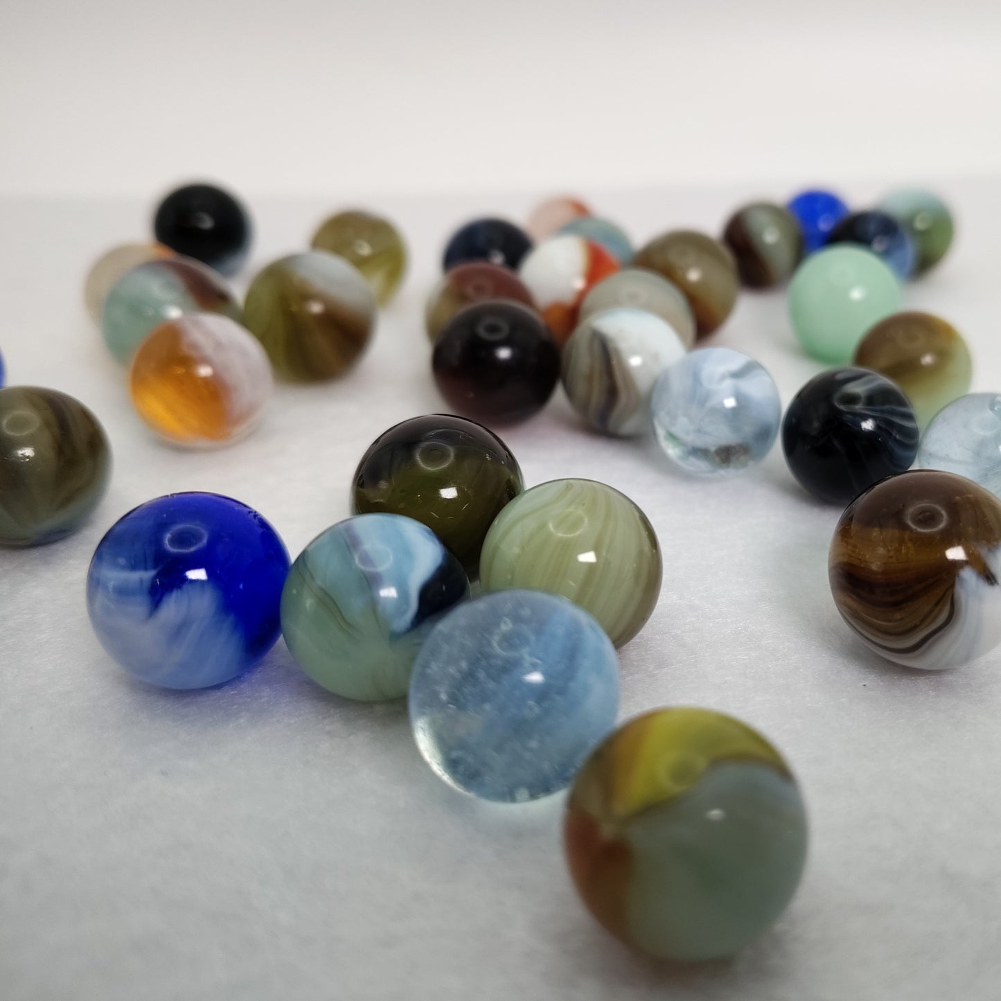 4pk Lot of Master Made Marbles - NM-M various sizes